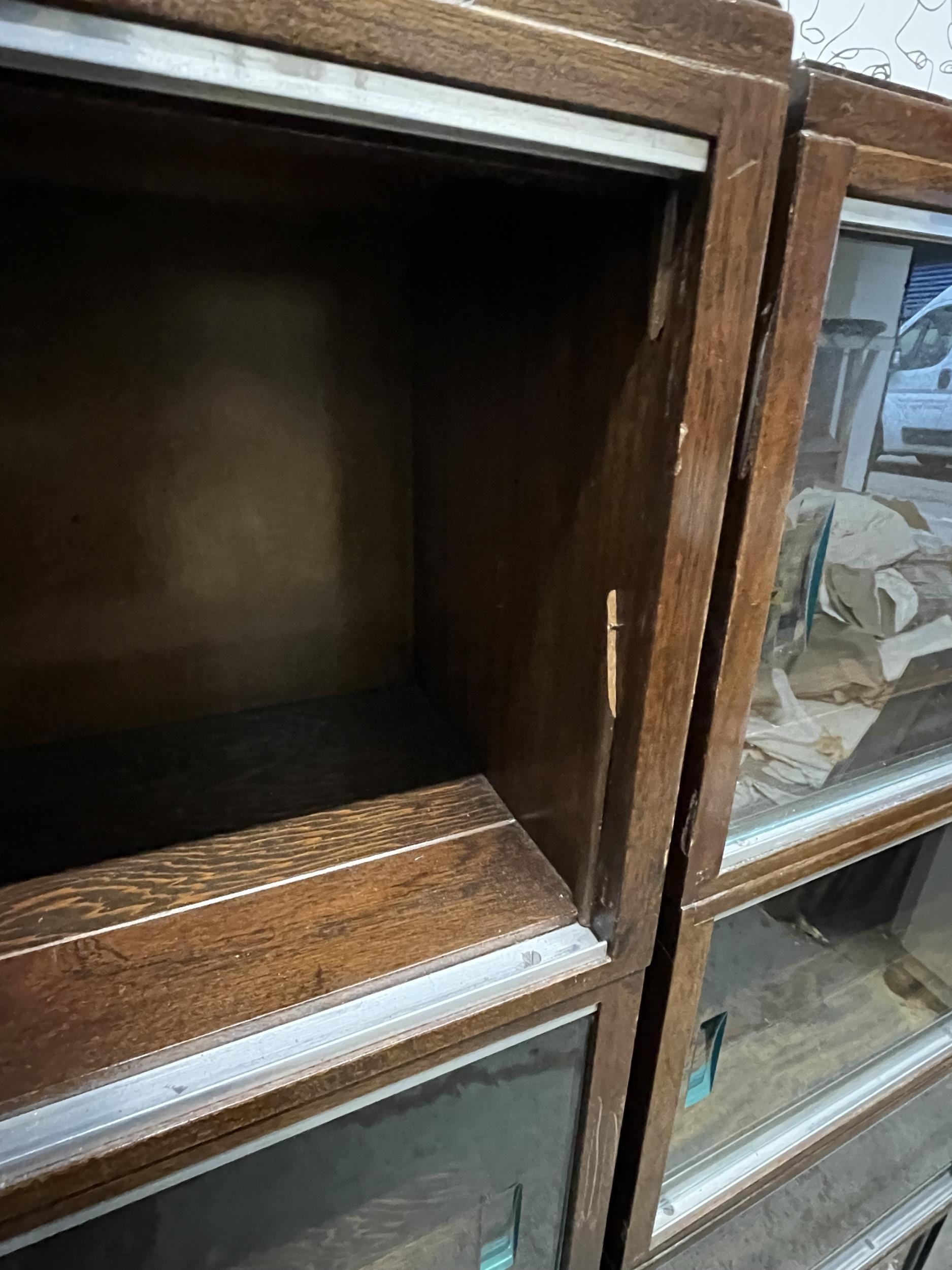 Bookcases, a pair mid century teak with plate glass sliding doors. H.121 W.89 D.23cm. - Image 4 of 5