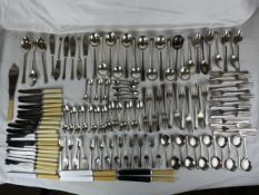 An extensive set of silver plated cutlery along with bone handled knives.