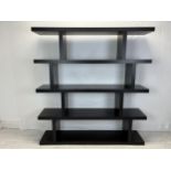 A contemporary full height ebonised hardwood display shelf. H.173 W.162.5 D.36cm.