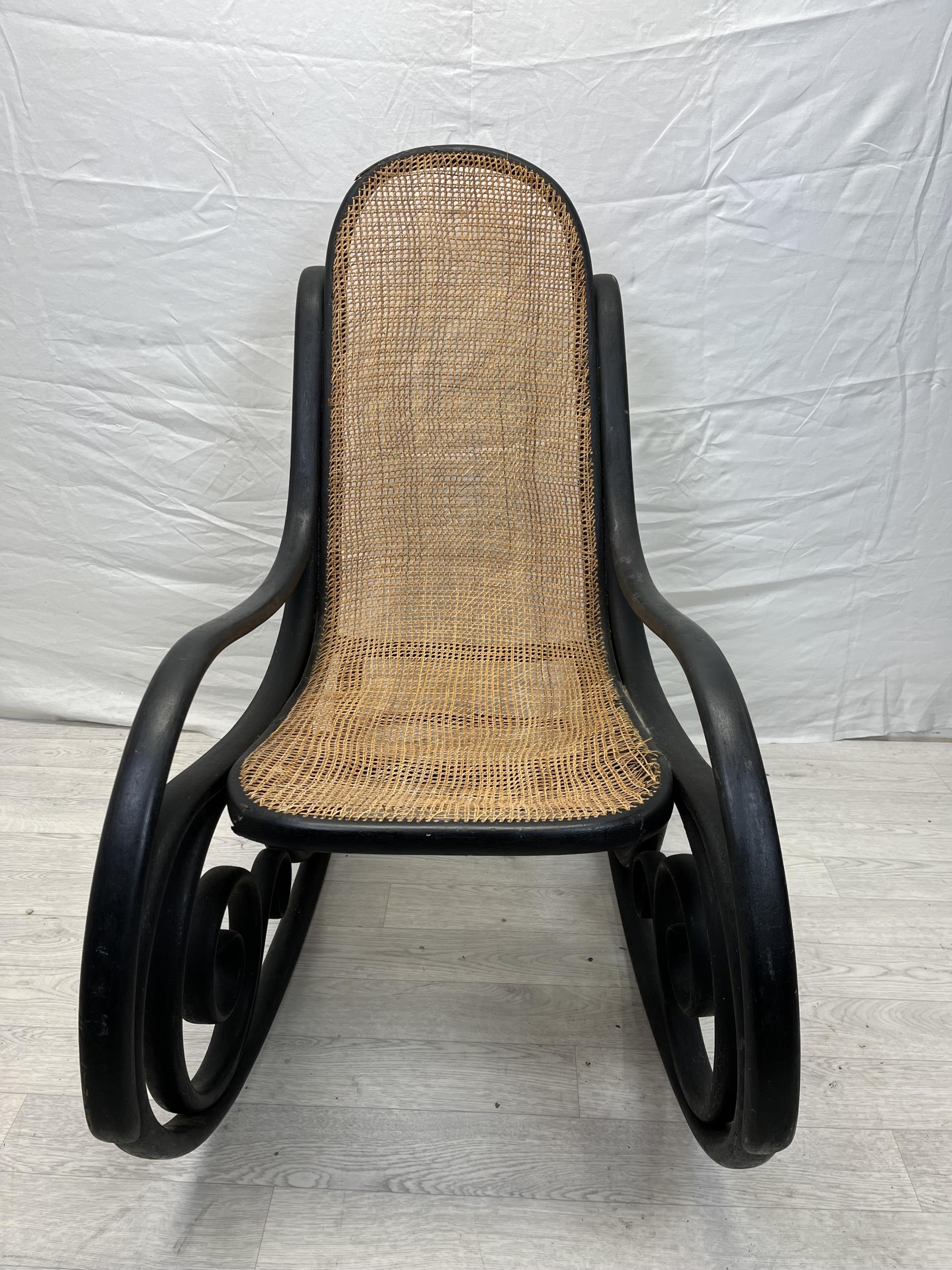 Rocking chair, 19th century Thonet style bentwood with caned seat. H.102cm.