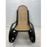 Rocking chair, 19th century Thonet style bentwood with caned seat. H.102cm.