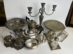 A mixed collection of silver plate to include candelabra, coffee set etc. H.35 W.34cm.