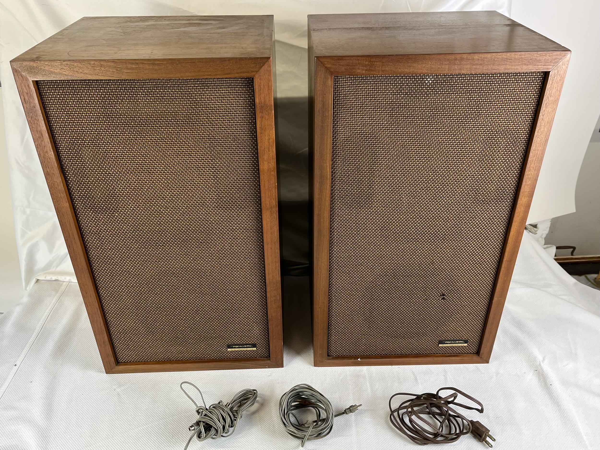 A pair of vintage Realistic “Electrostat” 1970 speakers.