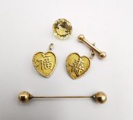A pair of 15ct yellow gold Chinese heart shaped cufflinks with Chinese characters on them (one