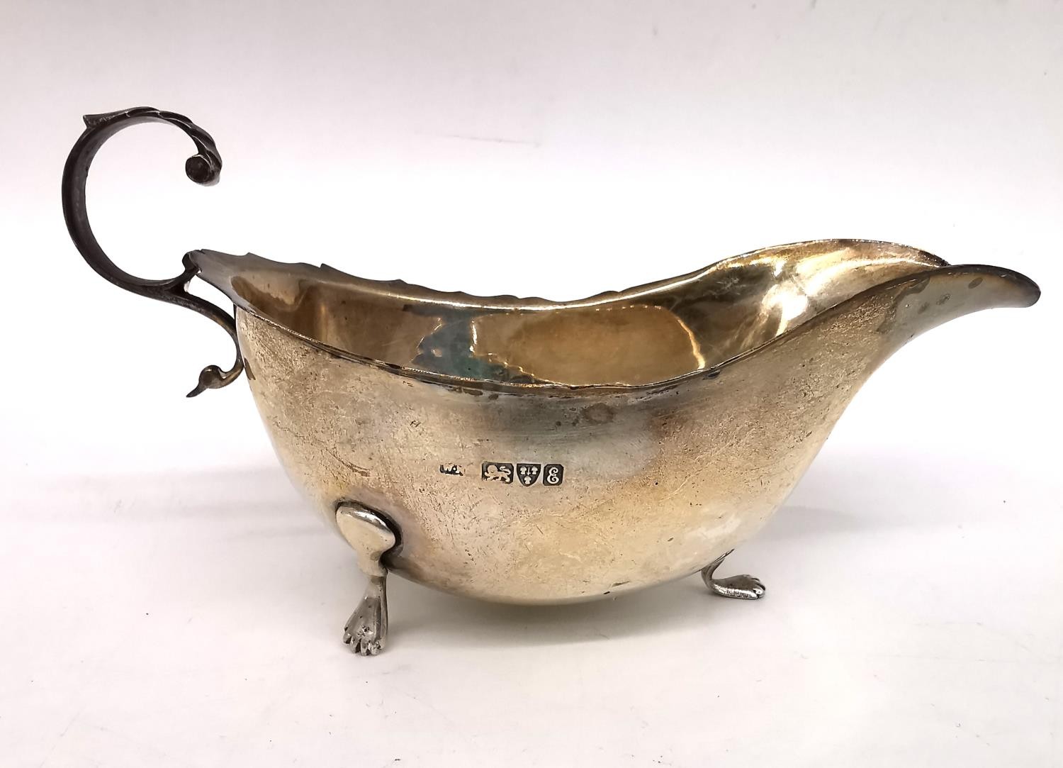 A Victorian silver gravy boat by William Neale along with a 1930s twin handled silver sugar bowl - Image 2 of 7