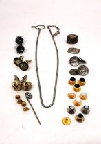 A collection of gentlemen's accessories, including a pair of silver and black star sapphire