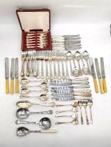 A large collection of silver plated flatware to include some steel and bone handled pieces.