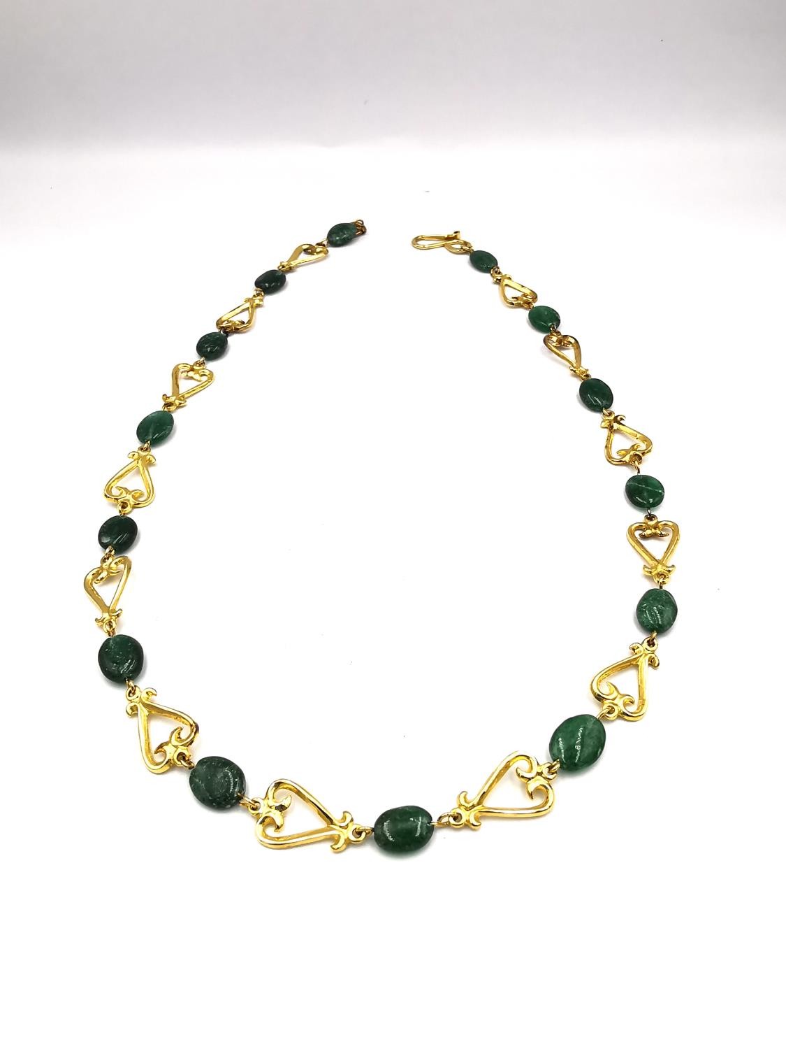 A boxed Past Times necklace based on a Roman Lyre necklace from 2nd century AD, gold plated on