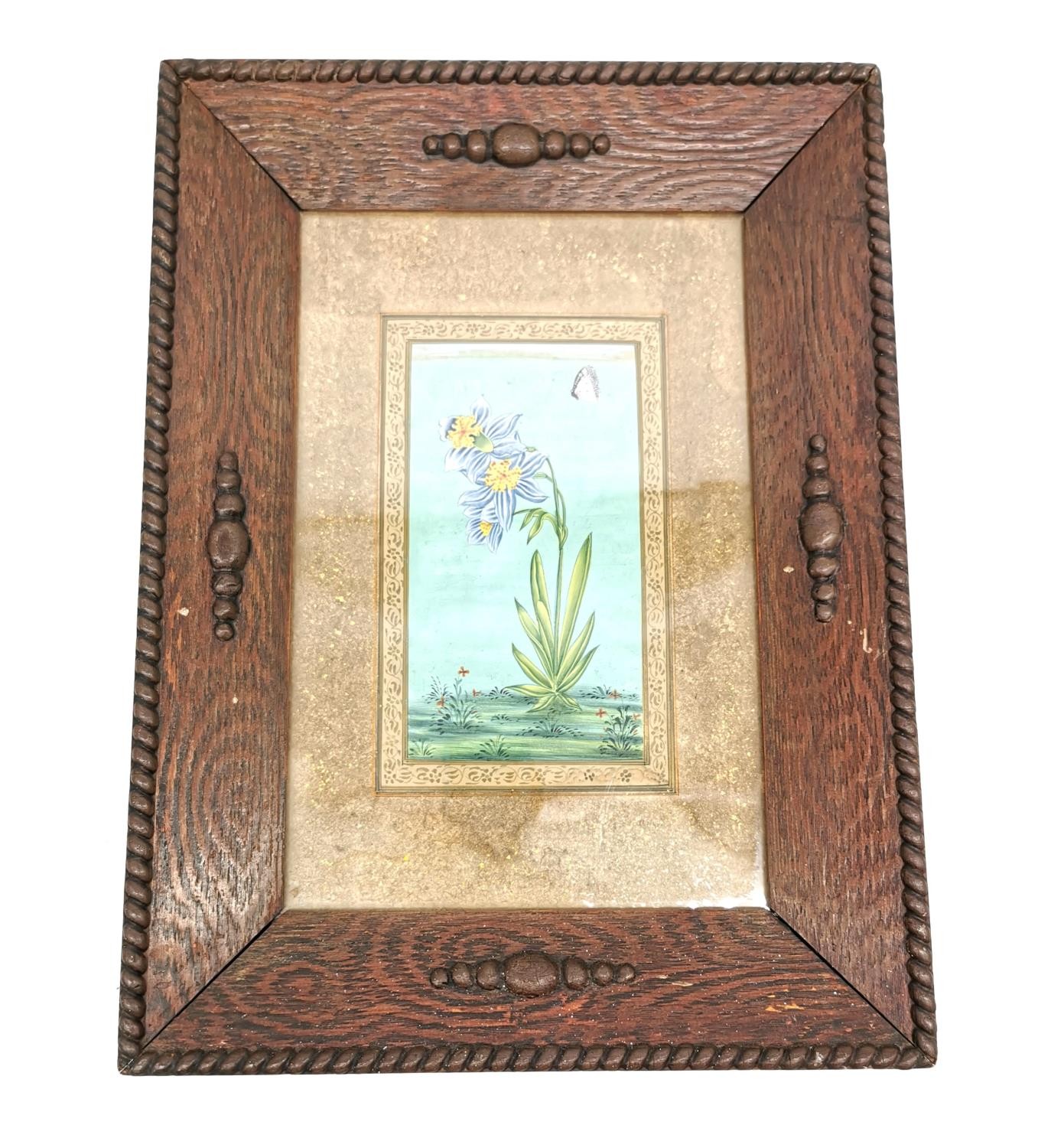 A 19th century Indo-Persian gouache on paper of a blue striped flower and butterfly within a - Image 2 of 6