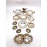 A collection of silver and silver plate, including two twin handled pedestal bon bon dishes, a