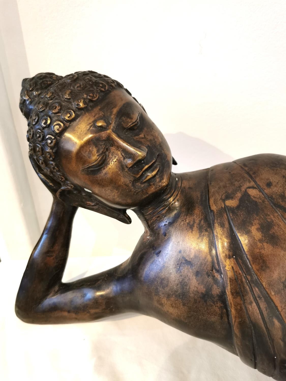 An early 20th century large brass reclining buddha. L.100 H.26 D.20cm. - Image 4 of 8