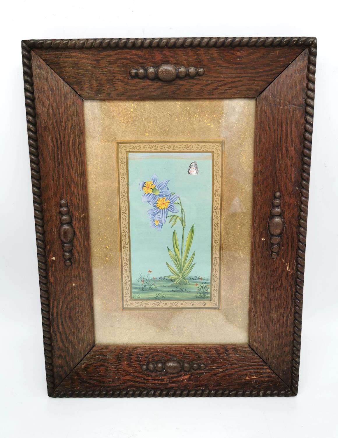 A 19th century Indo-Persian gouache on paper of a blue striped flower and butterfly within a - Image 3 of 6