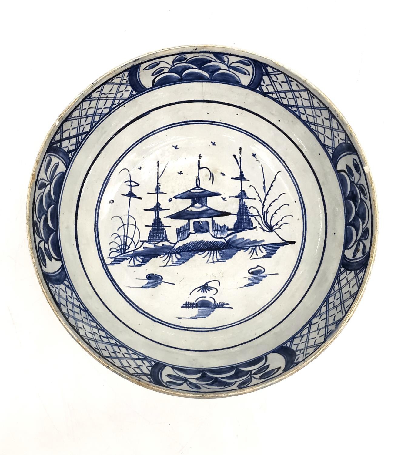 A 18th century Delft blue and white Chinese design bowl with pagoda and tree design. (chipped and - Image 4 of 12