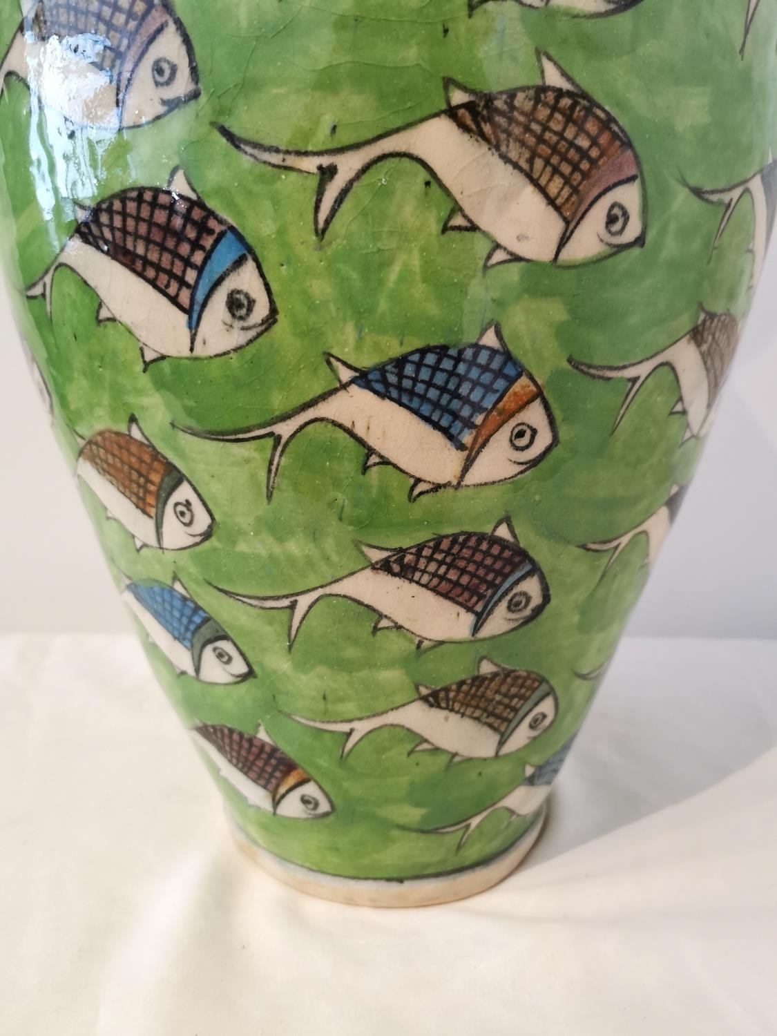 A large twin handled Persian Iznik ceramic vase with green ground and painted fish. H.54 D.25cm. - Image 7 of 12