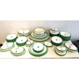 A 19th century hand painted large twelve person part dinner service with Christie coat of arms,