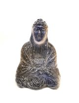 A 19th century faience blue and amber glaze ceramic Buddha statue. H.33 W.24 D.16cm.