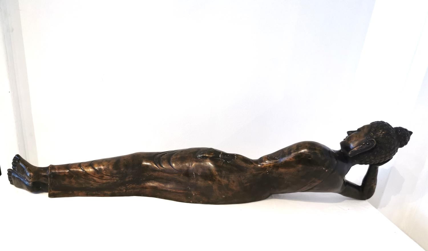 An early 20th century large brass reclining buddha. L.100 H.26 D.20cm. - Image 2 of 8