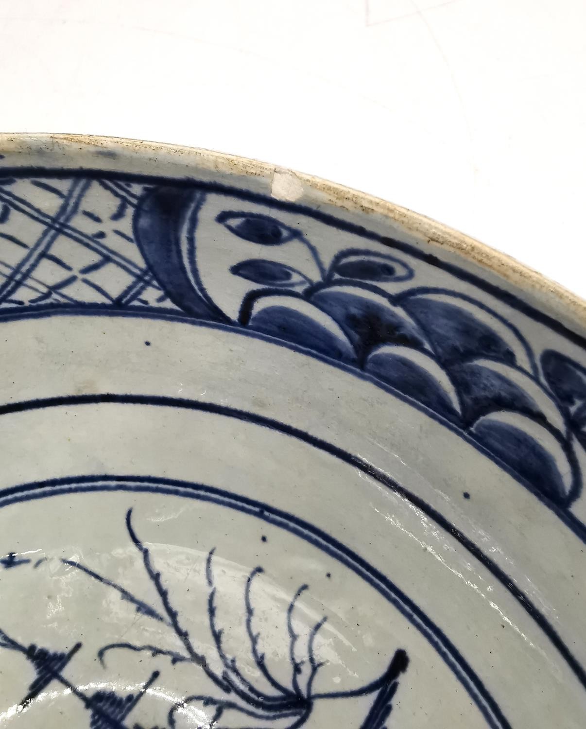 A 18th century Delft blue and white Chinese design bowl with pagoda and tree design. (chipped and - Image 11 of 12