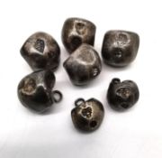 A set of Thai silver bullet money dress studs, Rama IV, bullet coinage with applied loops. Mongkut