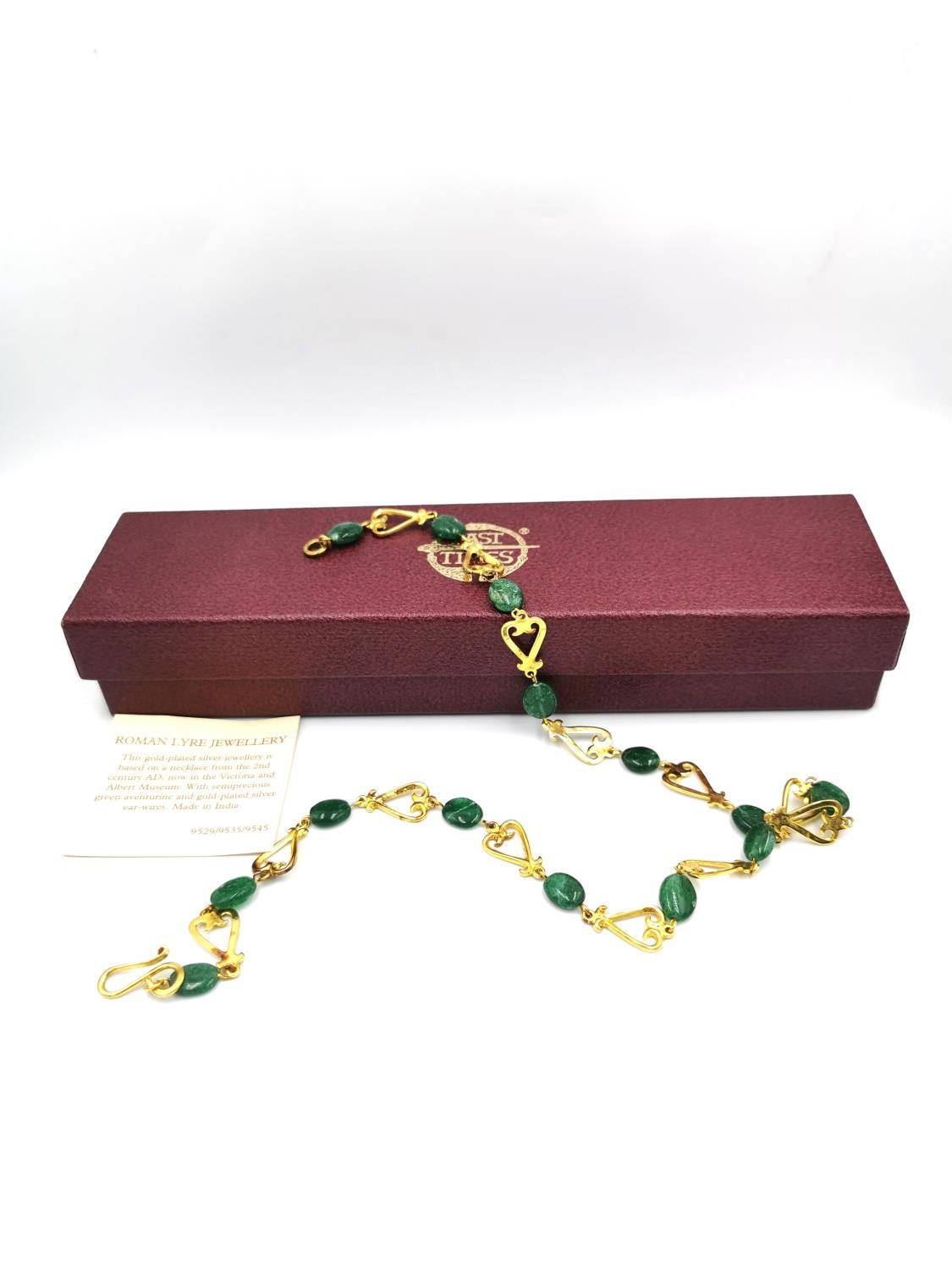 A boxed Past Times necklace based on a Roman Lyre necklace from 2nd century AD, gold plated on - Image 2 of 7