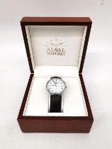 A boxed Alsal Swiss made stainless steel automatic gentleman's water resistant watch with brown