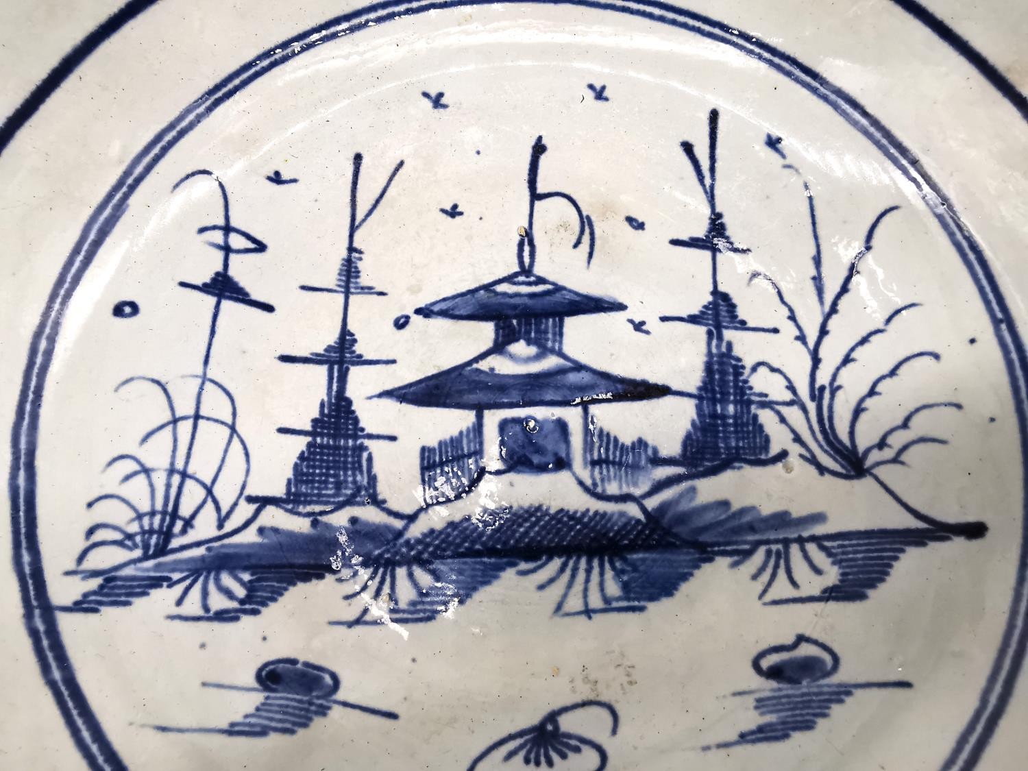 A 18th century Delft blue and white Chinese design bowl with pagoda and tree design. (chipped and - Image 9 of 12