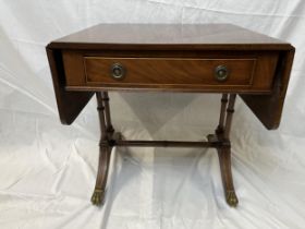 A small Regency style mahogany sofa table. H.51 W.51 D.45.5cm. Extended W.88.5cm.