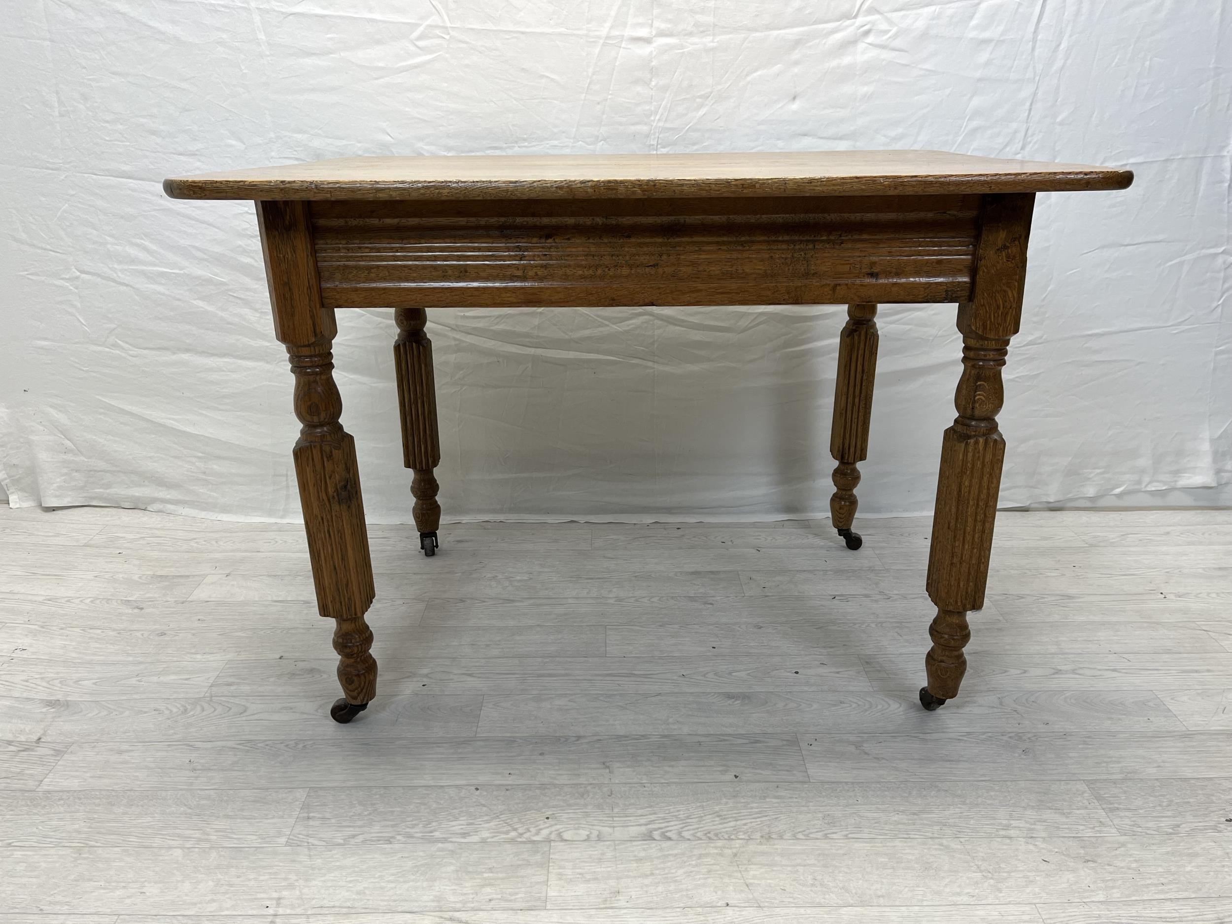 Dining or kitchen table, 19th century ash. H.75 W.107 D.76.5cm.