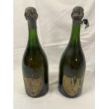 Two bottles of 1961 Dom Perignon champagne.