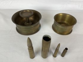 A collection of trench art and used ammunition.
