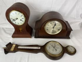 An Edwardian mahogany inlaid balloon mantle clock, an early 20th century mantel clock and a mahogany