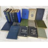 A collection of vintage naval books and manuals.