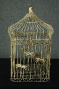 A distressed painted metal 19th century style bird cage. H.57cm.