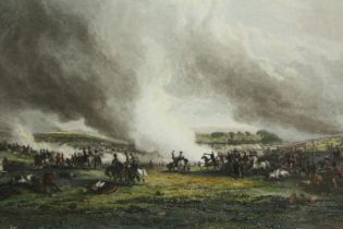 A framed and glazed print of the Battle of Waterloo. H.67 W.82cm.