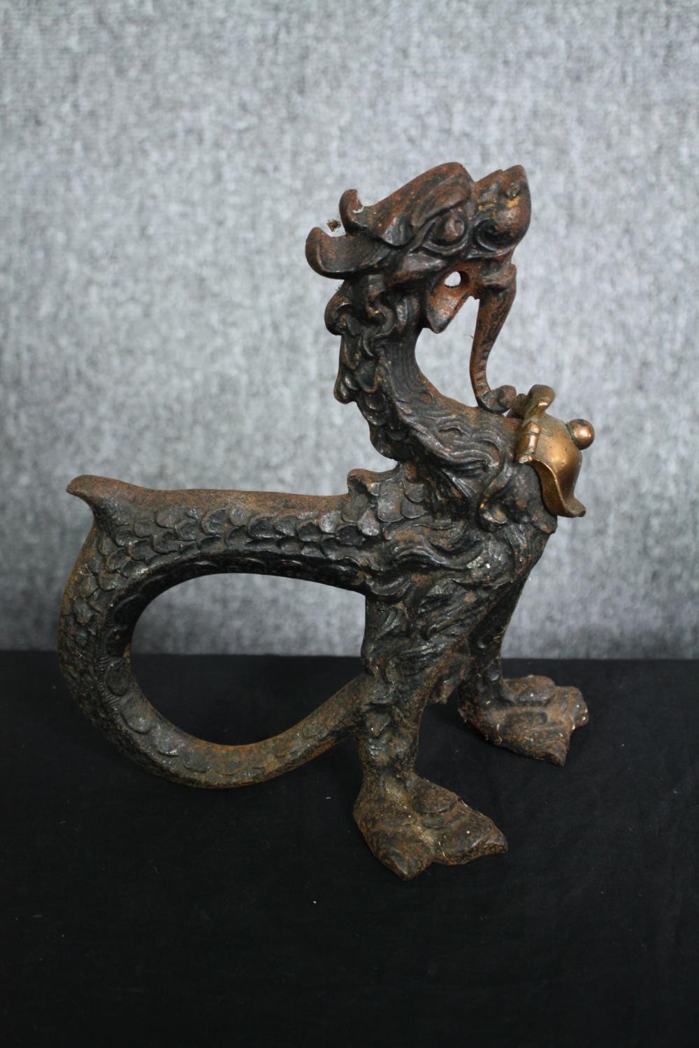 A pair of 19th century cast iron boot scrapers in the Chinese taste formed of chimeras. H.24cm. ( - Image 2 of 7