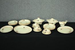 An Art Deco Crown Ducal dinner service. to include six dinner plates and large serving platters. L.