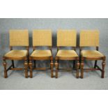 Dining chairs, a set of four mid century oak with their original upholstery material.