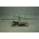 Coffee table, contemporary with plate glass top on a chrome base. H.42 W130cm.