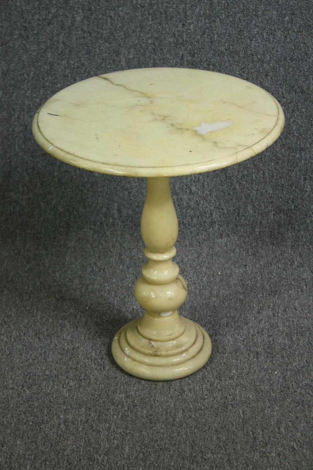 A marble pedestal lamp table. H.83 Dia.45cm.
