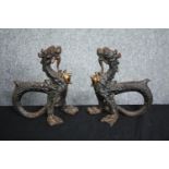 A pair of 19th century cast iron boot scrapers in the Chinese taste formed of chimeras. H.24cm. (