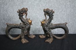 A pair of 19th century cast iron boot scrapers in the Chinese taste formed of chimeras. H.24cm. (
