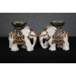 A pair of miniature glazed Eastern elephant stands. H.28cm. (Each).