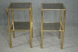 A pair of contemporary brass and glass lamp tables. H.73 W.40 D.40cm. (each)