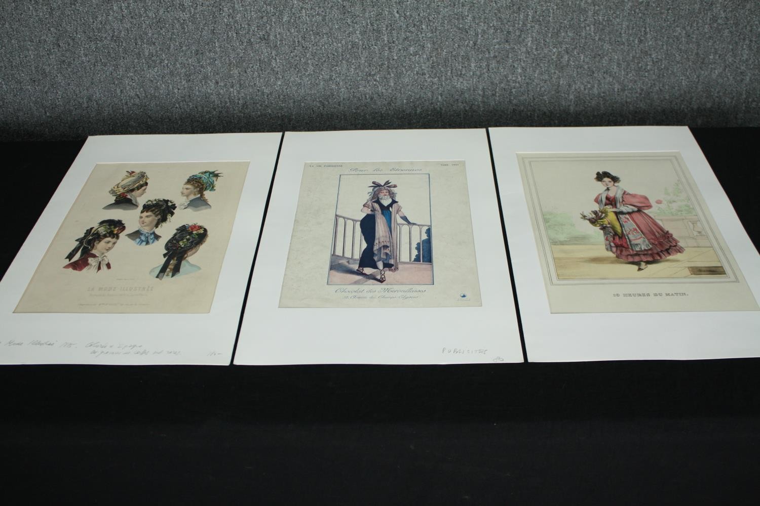 A set of three 19th century hand coloured engravings, French fashion. H.52 W.33cm. (each)