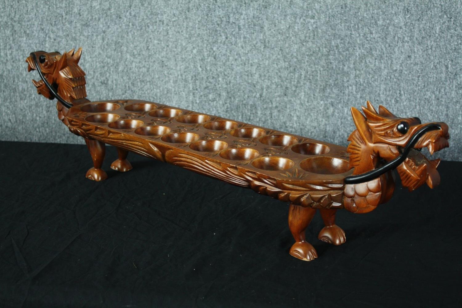 A hardwood decorative Mancala board game in the shape of a dragon. With carved decoration and - Image 3 of 5