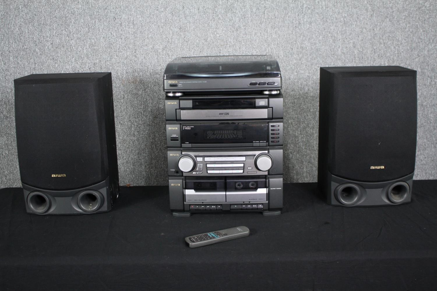 An Aiwa Hi Fi system to include turntable. H.50cm. (Largest).