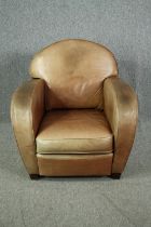 Armchair, contemporary vintage style in tan leather. H.92 W.86 D.80cm.
