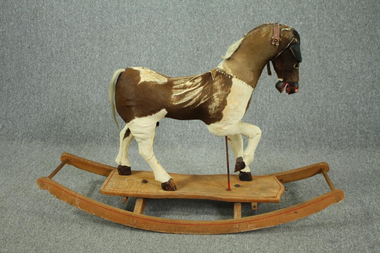 A vintage rocking horse in cowhide covering. H.74 W.110 D.38cm. - Image 6 of 14