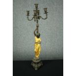 An early 20th century gilt spelter figural candelabra. H.74cm.