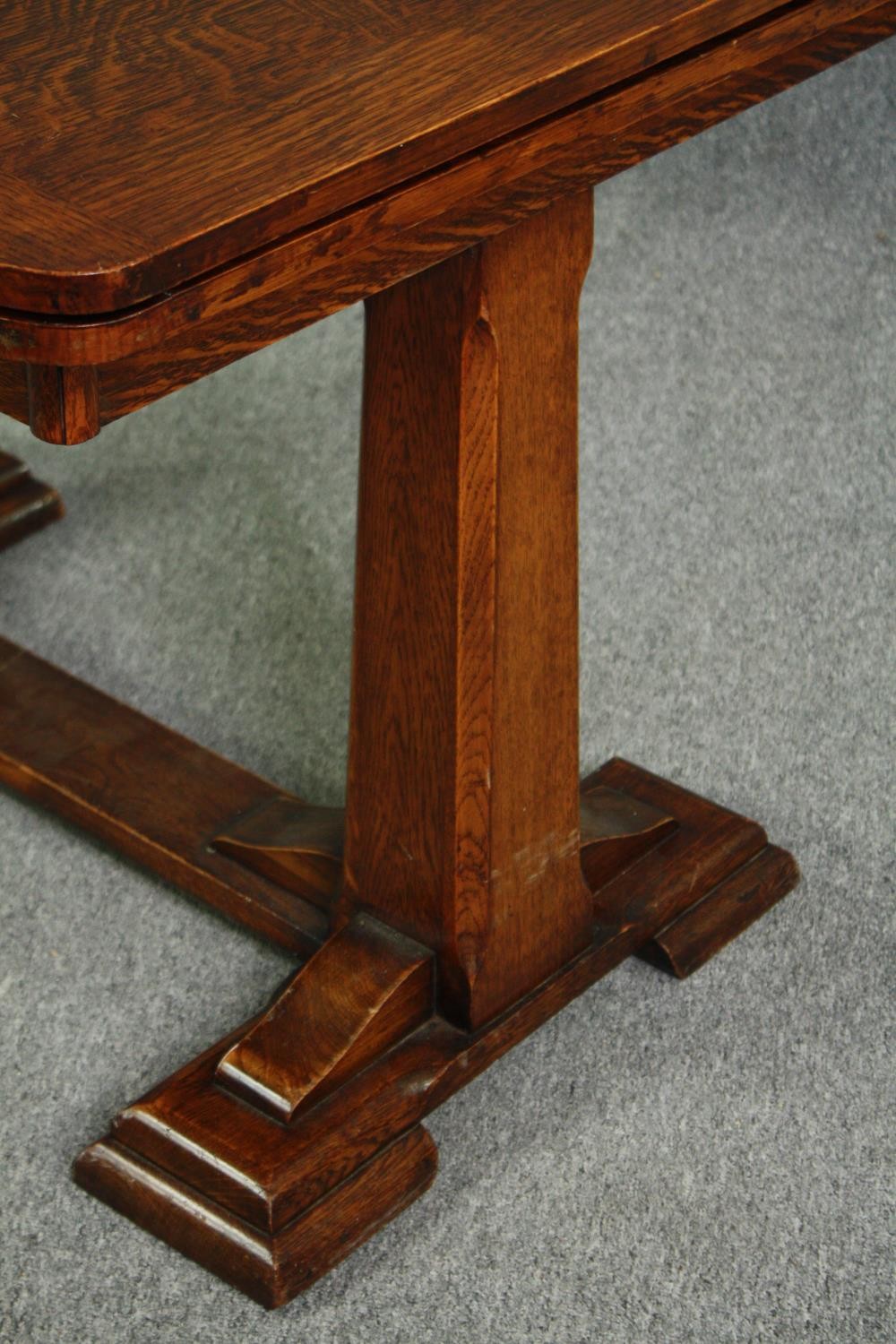 Dining table, mid century oak, draw leaf action. H.76 W.172. (ext) D.91cm. (In need of repair). - Image 6 of 9